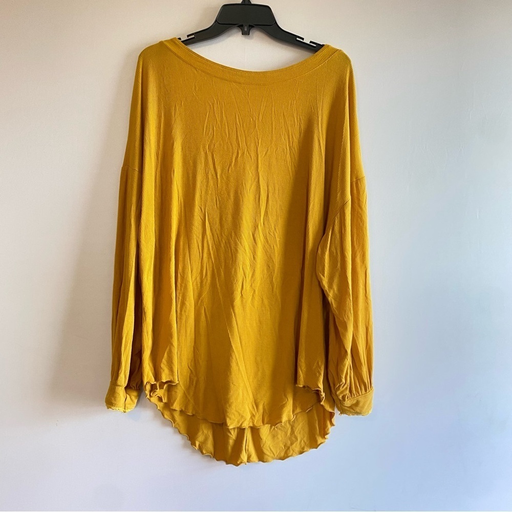 Free people Yellow Longsleeve open back with Asymmetrical Hem and‎ Relaxed Fit